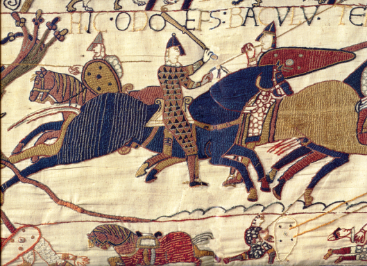 A segment of the Bayeux Tapestry depicting Odo, Earl of Kent rallying Duke William's troops at the Battle of Hastings (Photo credit: Wikipedia)